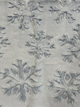 Load image into Gallery viewer, Powder embossed snowflakes on pearl Willow 50 x 60 defect (small snag stitched closed)
