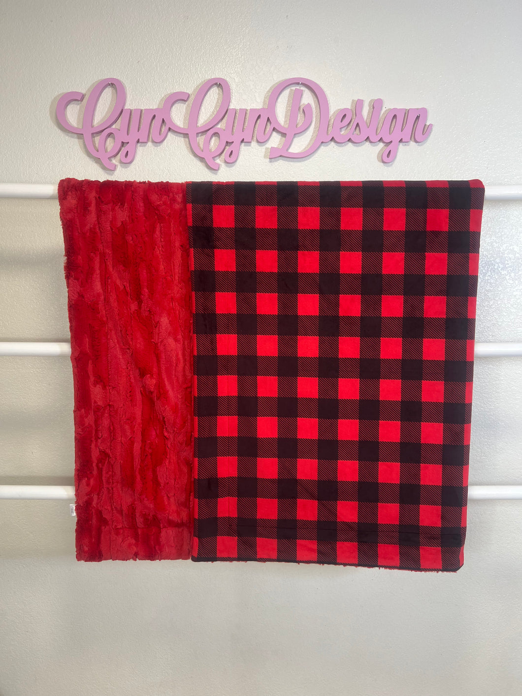 Red buffalo check print on Cardinal Willow 60x57 defect (very light creasing)